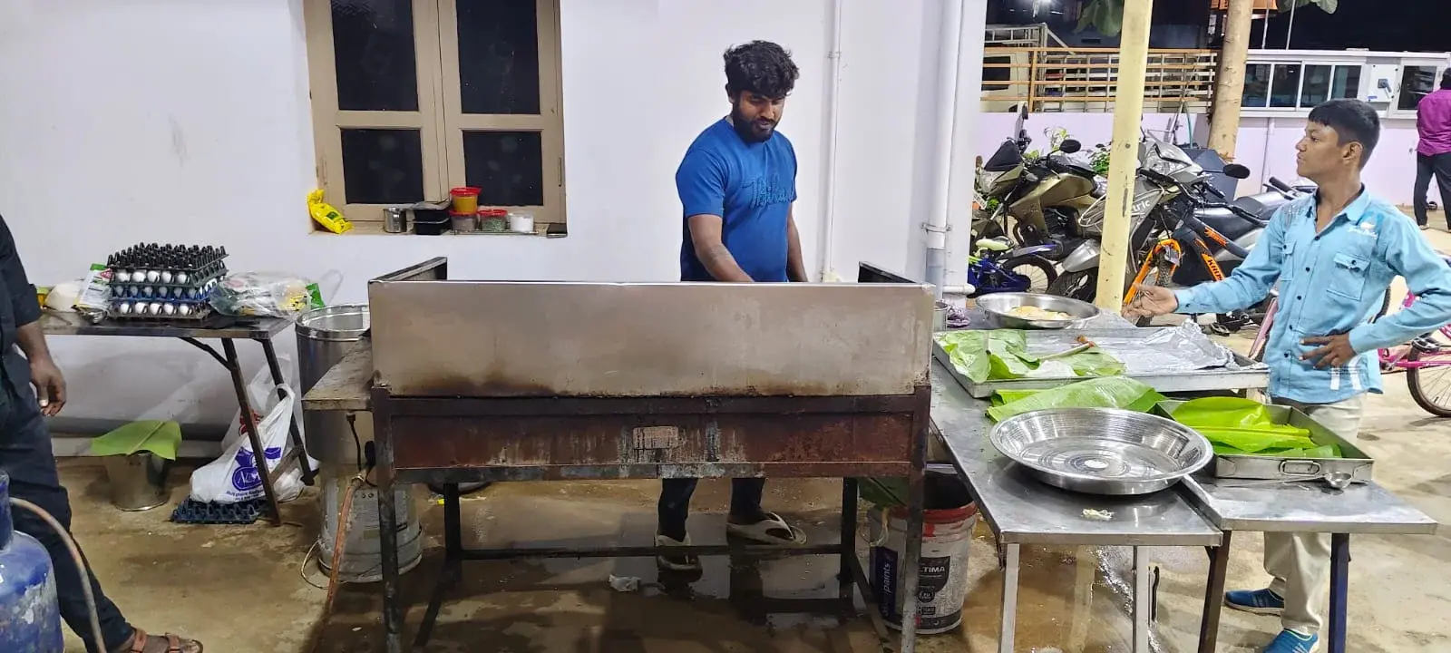 On-site chef preparing live dosa station for function