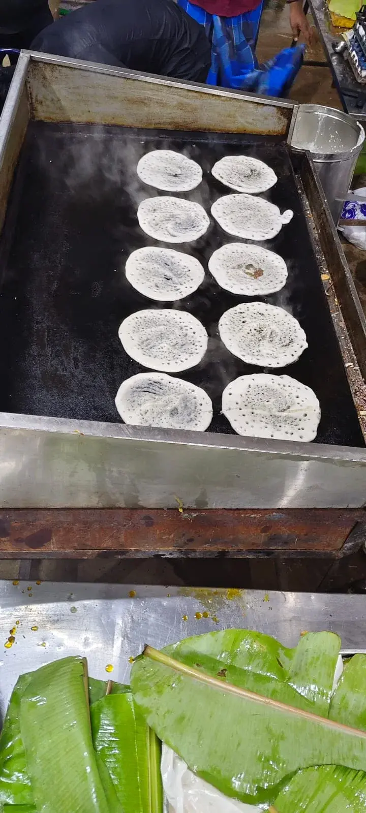 Chef making dosa live at catering event